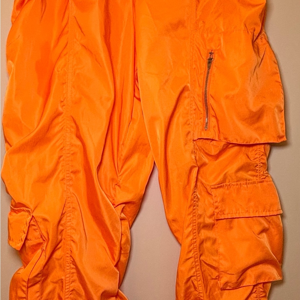 Orange parachute pants